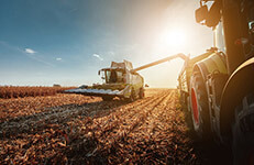 farm tractors, shot of a harvester in the field